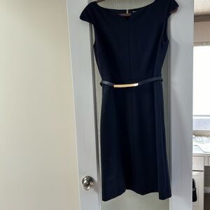 Tory Burch dress with gold detail belt.